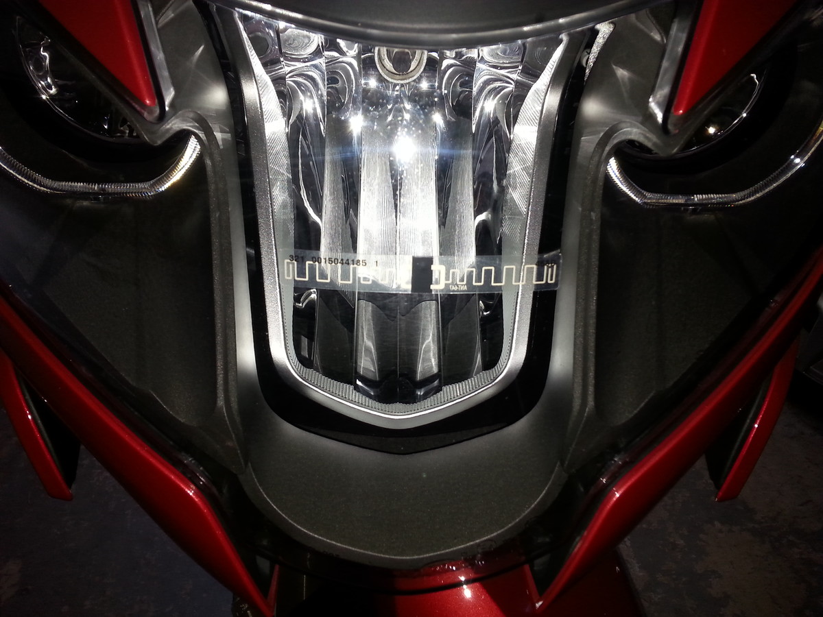 Toll pass tag mounting on bike Peach Pass) headlight