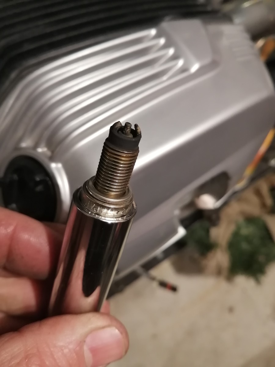 Fouled spark plugs and air filter smell like gas Camheads