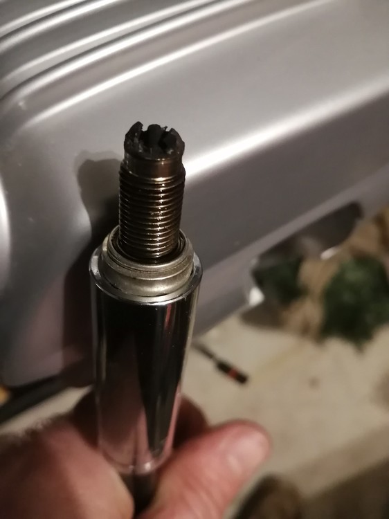 Fouled spark plugs and air filter smell like gas Camheads